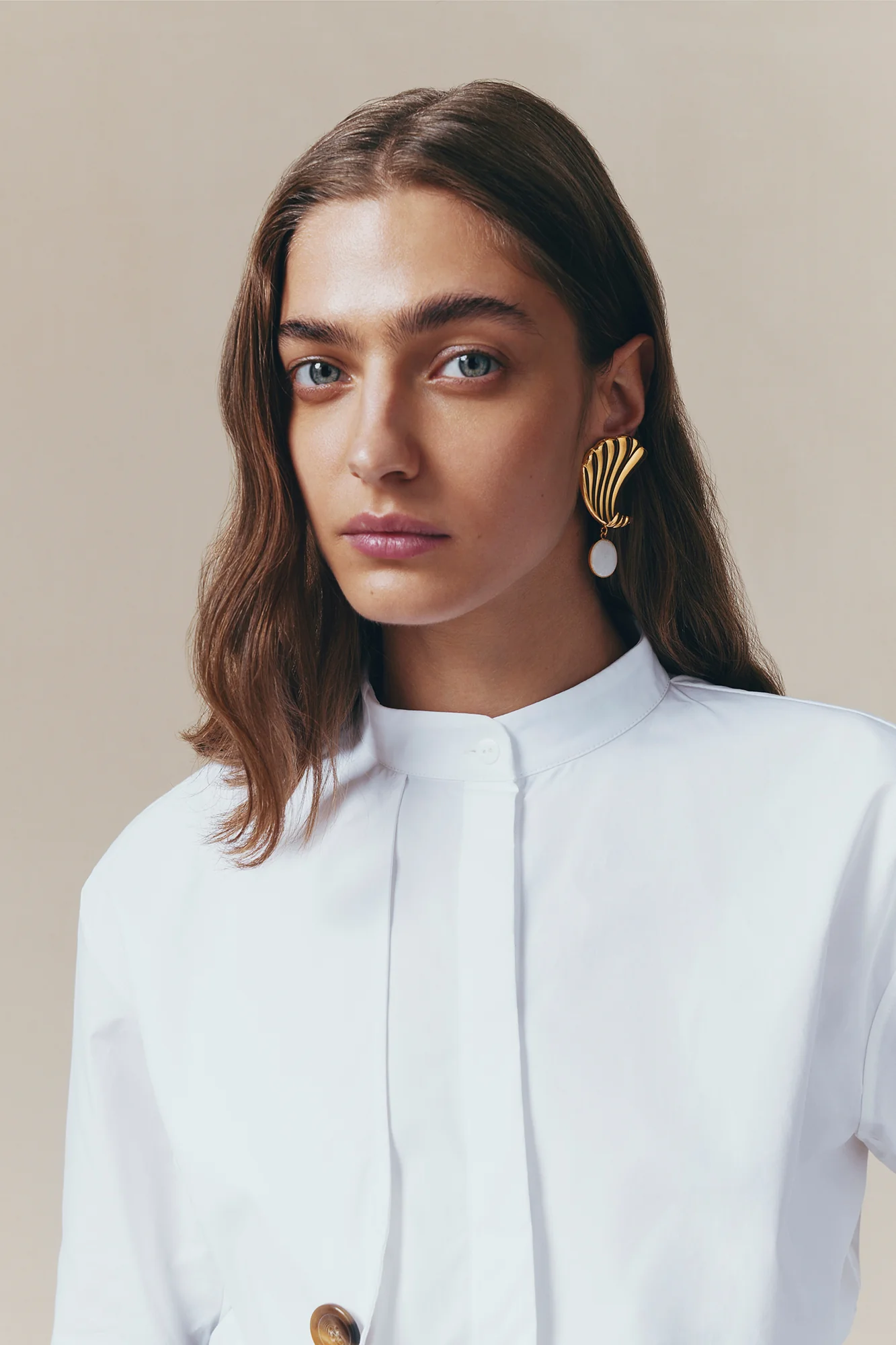Gold Sculptural Stud Earrings With Stone Detail - Image 5